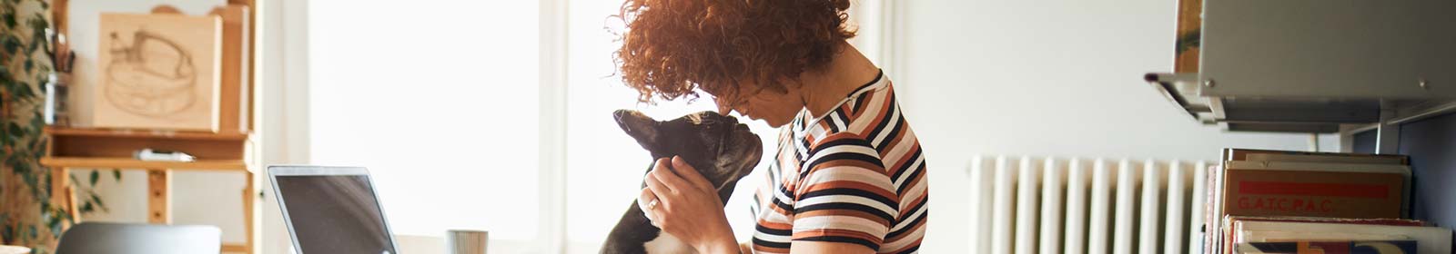 Lady with her dog at home