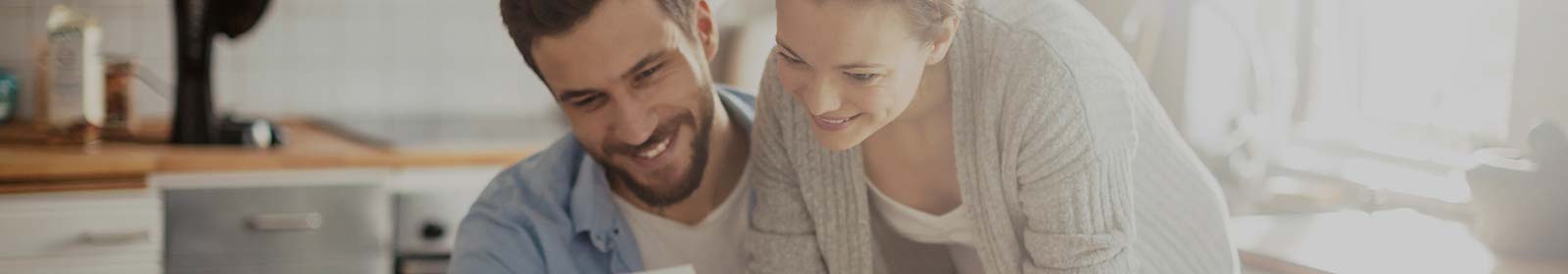 Couple looking at a laptop computer